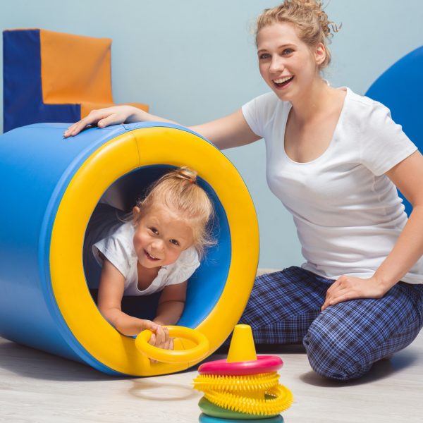 Child exercising during occupational therapy Child exercising during occupational therapy